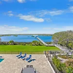 Waterfront Vacation Home With Heated Pool Dock And Beach Nearby